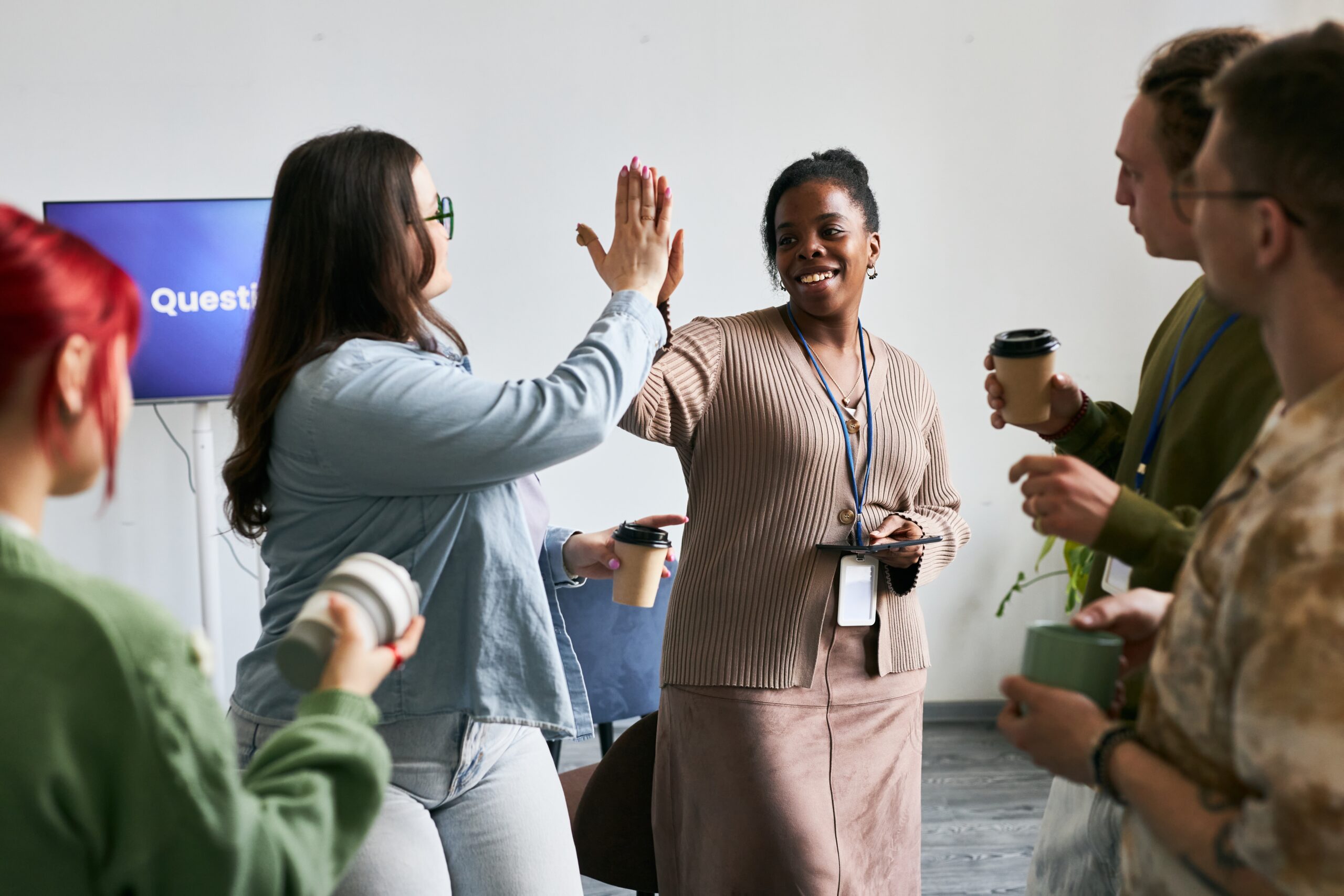 celebrating success by giving high five in office 2025 03 06 06 54 54 utc scaled